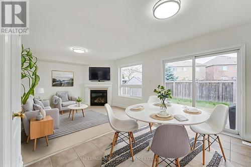 386 Reeves Way Boulevard, Whitchurch-Stouffville, ON - Indoor Photo Showing Dining Room With Fireplace