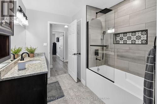 Large Bathroom with new waterfall shower/tub - 5 Maureen Court, Pelham (Fonthill), ON - Indoor Photo Showing Bathroom