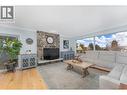 431 Upland Drive, Coldstream, BC  - Indoor Photo Showing Living Room With Fireplace 