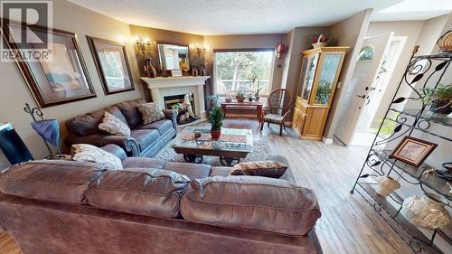 5270 Mackay Crescent, 108 Mile Ranch, BC - Indoor Photo Showing Living Room With Fireplace