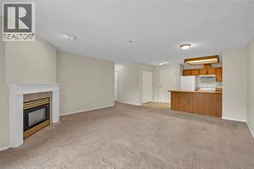 3310 Skaha Lake Road Unit# 306, Penticton, BC - Indoor With Fireplace