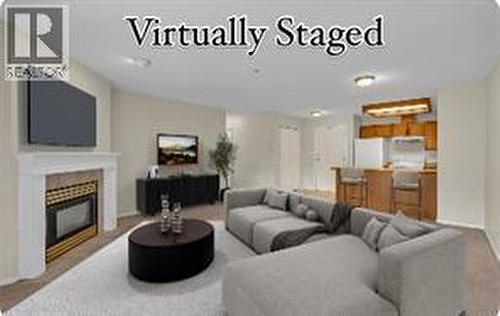 3310 Skaha Lake Road Unit# 306, Penticton, BC - Indoor Photo Showing Living Room With Fireplace