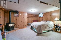 2nd bedroom with gas fireplace. - 