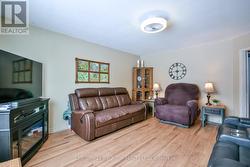 Spacious living room with huge window. - 