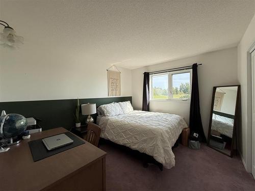 408 Dixie Road, Swan River, MB - Indoor Photo Showing Bedroom