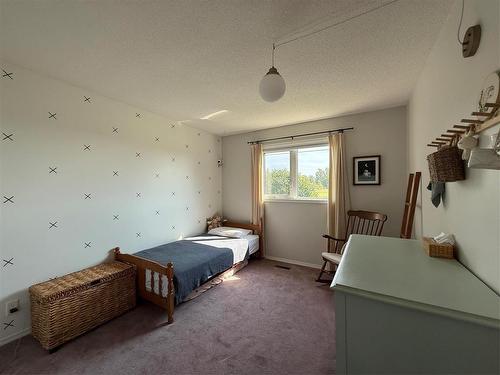 408 Dixie Road, Swan River, MB - Indoor Photo Showing Bedroom