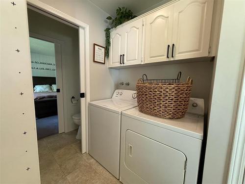 408 Dixie Road, Swan River, MB - Indoor Photo Showing Laundry Room