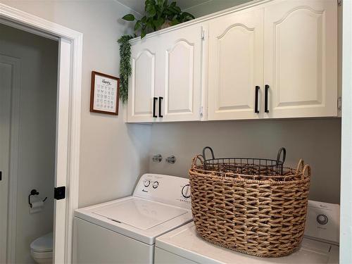 408 Dixie Road, Swan River, MB - Indoor Photo Showing Laundry Room