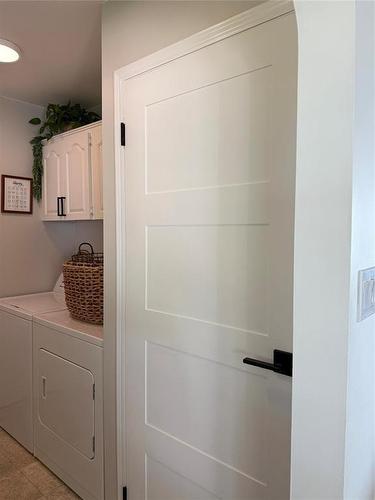 408 Dixie Road, Swan River, MB - Indoor Photo Showing Laundry Room