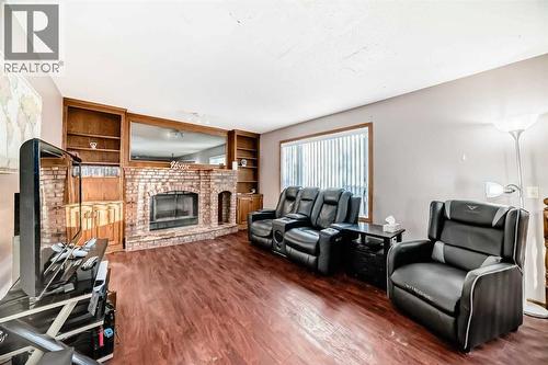 78 Sandringham Way Nw, Calgary, AB - Indoor Photo Showing Living Room With Fireplace