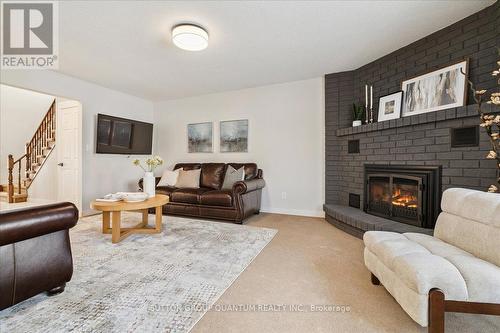 32 Capri Street, Thorold, ON - Indoor Photo Showing Living Room With Fireplace