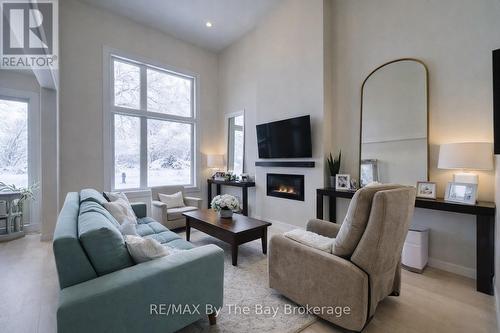 33 Nicort Road, Wasaga Beach, ON - Indoor Photo Showing Living Room With Fireplace