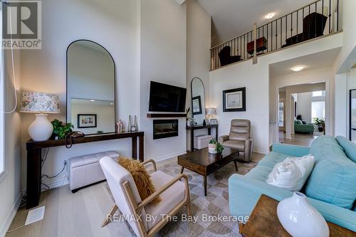 33 Nicort Road, Wasaga Beach, ON - Indoor Photo Showing Living Room With Fireplace