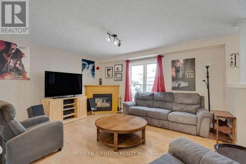 187 Milne Place, Guelph/Eramosa, ON - Indoor Photo Showing Living Room With Fireplace