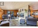 2549 Rose Drive, 150 Mile House, BC  - Indoor Photo Showing Living Room With Fireplace 