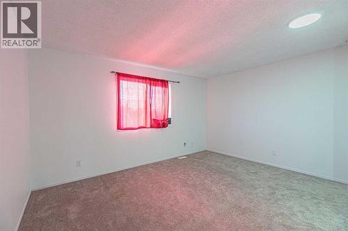 38 Martindale Drive Ne, Calgary, AB - Indoor Photo Showing Other Room