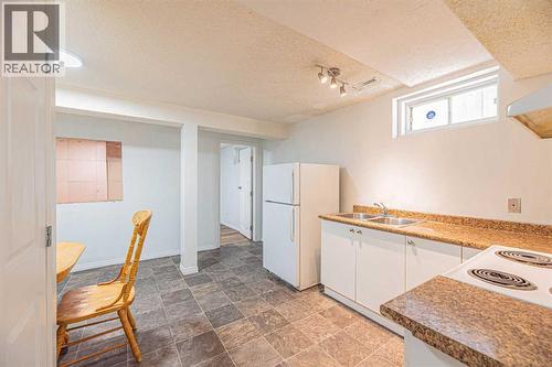 38 Martindale Drive Ne, Calgary, AB - Indoor Photo Showing Kitchen With Double Sink