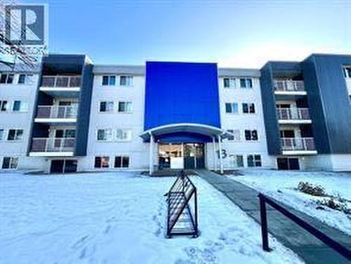 206, 7 Clearwater Crescent, Fort Mcmurray, AB - Outdoor With Balcony With Facade