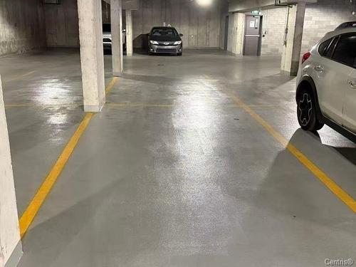 Garage - 311-1801 Rue Viola-Desmond, Montréal (Lasalle), QC - Indoor Photo Showing Garage