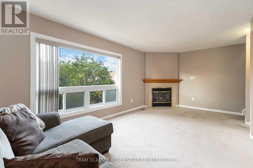 63 - 1990 Wavell Street, London East (East I), ON - Indoor Photo Showing Living Room With Fireplace