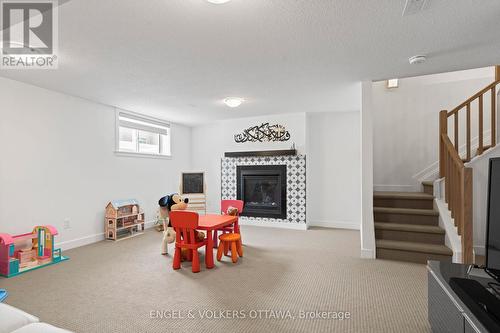 2038 Allegrini Terrace, Ottawa, ON - Indoor With Fireplace