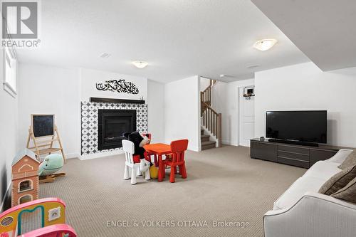 2038 Allegrini Terrace, Ottawa, ON - Indoor With Fireplace