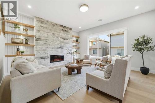 425 Watercrest Place, Chestermere, AB - Indoor Photo Showing Living Room With Fireplace