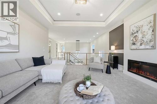 425 Watercrest Place, Chestermere, AB - Indoor Photo Showing Living Room With Fireplace