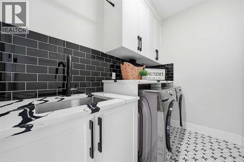 425 Watercrest Place, Chestermere, AB - Indoor Photo Showing Laundry Room