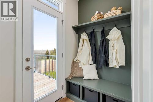 PLEASE NOTE: Photos are of a finished Showhome of the same model – fit and finish may differ on finished spec home. Interior selections and floorplans shown in photos - 154 Bartlett Crescent Se, Calgary, AB - Indoor