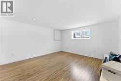 Lower level recreation room with large windows - 