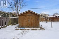 View of shed featuring a fenced backyard - 
