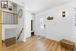 Entrance foyer to open concept - built in bench and closet for easy storage - 