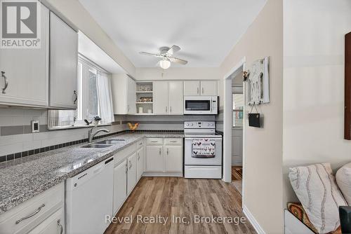 8 Manitou Crescent, Tiny, ON - Indoor Photo Showing Kitchen With Double Sink