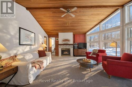 8 Manitou Crescent, Tiny, ON - Indoor Photo Showing Living Room With Fireplace