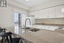 321 - 1440 Gordon Street, Guelph (Pineridge/Westminster Woods), ON  - Indoor Photo Showing Kitchen With Double Sink With Upgraded Kitchen 