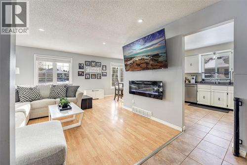 216 Blackthorn Crescent, St Clair, ON - Indoor Photo Showing Living Room With Fireplace