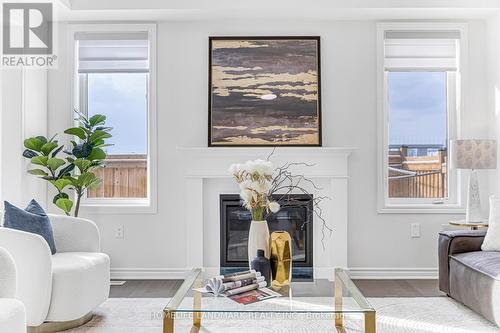 89 Barkerville Drive, Whitby, ON - Indoor Photo Showing Living Room With Fireplace