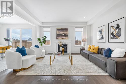 89 Barkerville Drive, Whitby, ON - Indoor Photo Showing Living Room With Fireplace