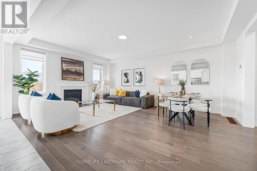 89 Barkerville Drive, Whitby, ON - Indoor With Fireplace