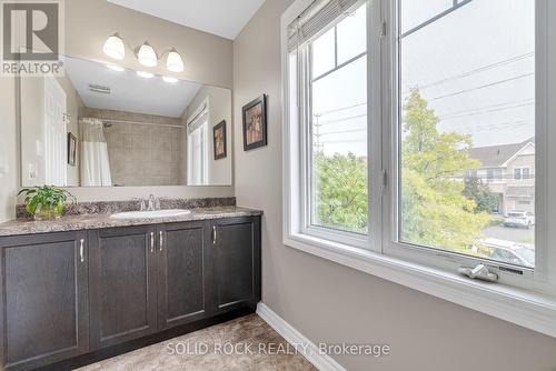 The main bathroom is enhanced by a large window - 1855 Maple Grove Road, Ottawa, ON - Indoor Photo Showing Bathroom