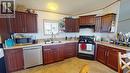 7926 85A Avenue, Fort St. John, BC  - Indoor Photo Showing Kitchen With Double Sink 