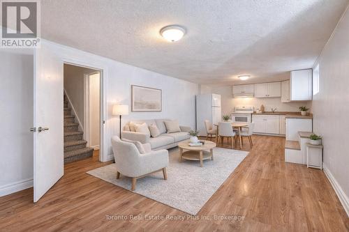Virtually Staged for Concept - 62 Greendale Crescent, Kitchener, ON - Indoor Photo Showing Living Room