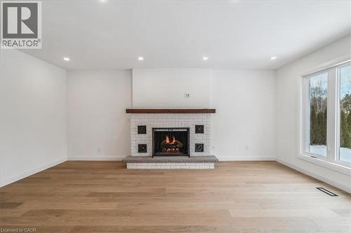 Family Room - 82 Marilyn Street, Caledon East, ON - Indoor Photo Showing Living Room With Fireplace