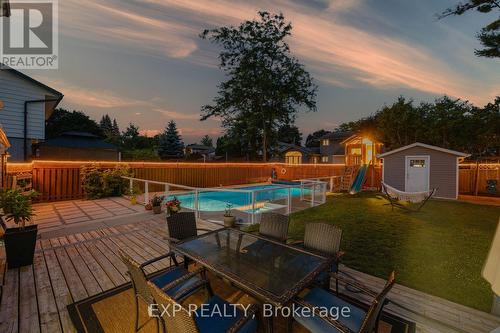 23 Dooley Drive, Kitchener, ON - Outdoor With In Ground Pool With Deck Patio Veranda