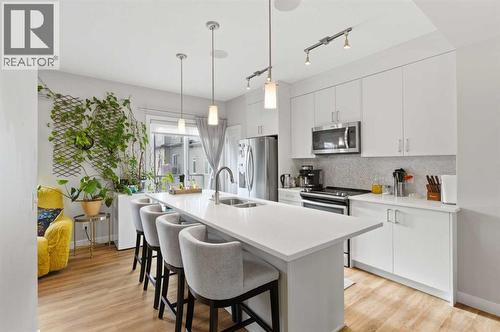 95 Sage Bluff Gate Nw, Calgary, AB - Indoor Photo Showing Kitchen With Stainless Steel Kitchen With Double Sink With Upgraded Kitchen