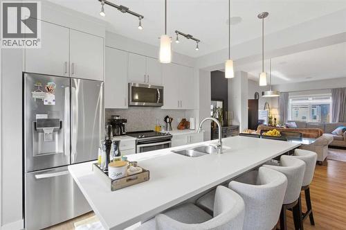 95 Sage Bluff Gate Nw, Calgary, AB - Indoor Photo Showing Kitchen With Stainless Steel Kitchen With Double Sink With Upgraded Kitchen