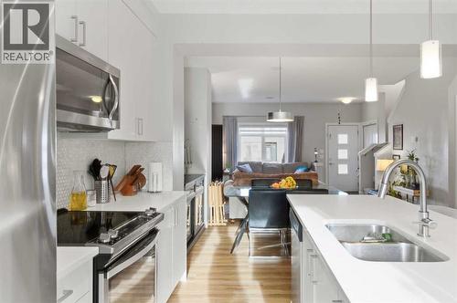 95 Sage Bluff Gate Nw, Calgary, AB - Indoor Photo Showing Kitchen With Stainless Steel Kitchen With Double Sink With Upgraded Kitchen