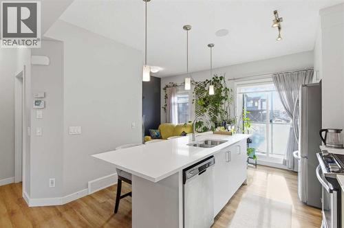 95 Sage Bluff Gate Nw, Calgary, AB - Indoor Photo Showing Kitchen With Double Sink