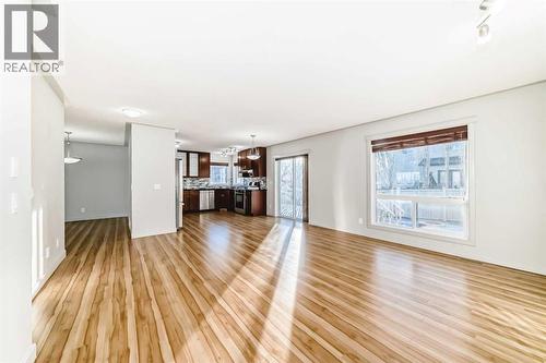 1156 Sherwood Boulevard Nw, Calgary, AB - Indoor Photo Showing Living Room